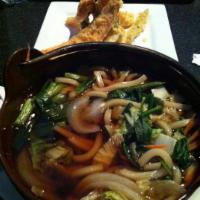Tempura Udon noodle soup · Noodles in a savory broth with vegetables and a side of mix tempura.