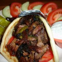 Gyro Sandwich · Whole size only. Beef, chicken, vegetarian (eggplant and spinach) or lamb (at an additional ...