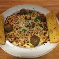 Baked Fettuccine with Meatballs · Fettuccine noodles in creamy Alfredo sauce with feta, Parmesan and mozzarella cheese.