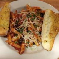 Penne Puttanesca · Penne pasta tossed with a tomato and basil sauce, Kalamata olives, capers and Parmesan chees...