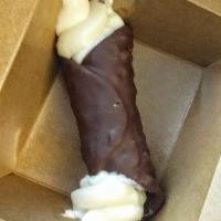Chocolate Cannoli · Chocolate cannoli shell, filled with our authentic handmade ricotta cheese cream.