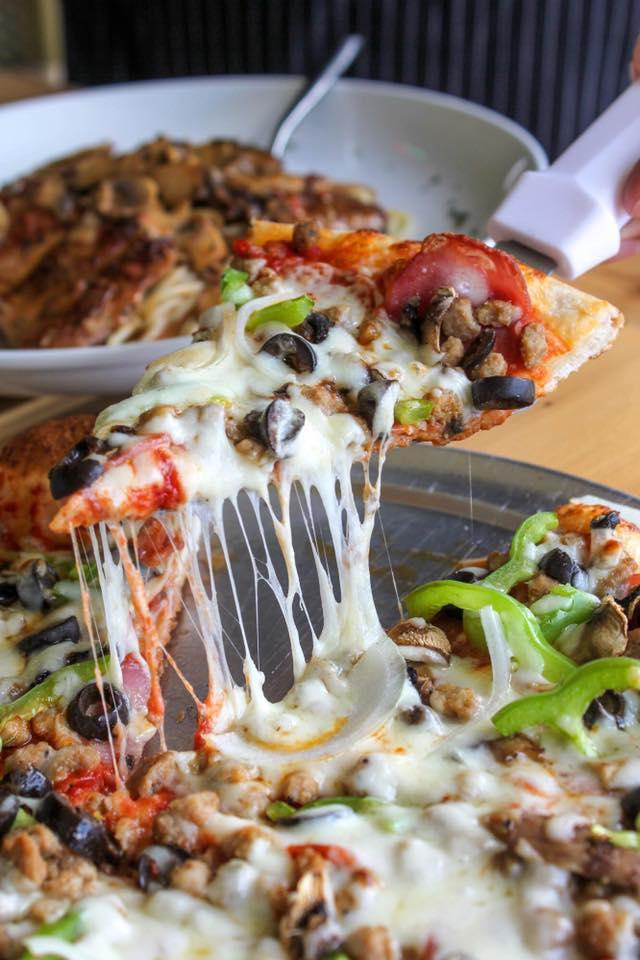 Tuscany Supreme Special Pizza · Italian sausage, pepperoni, Canadian bacon, mushrooms, bell peppers, black olives, and onions.