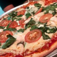Margherita Pizza · Sliced tomatoes, fresh basil, olive oil, and mozzarella cheese.