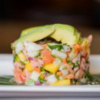 Ceviche de Salmon Dinner · Salmon accompanied with fresh lime juice, avocado, red onions, tomatoes, cilantro, cucumber,...