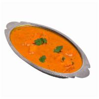 Chicken Tikka Masala · Chicken breast barbecued and cooked in creamy sauce with finely chopped bell peppers and oni...
