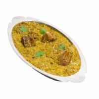 Lamb Saag · Lamb chunks cooked in smooth spinach gravy.