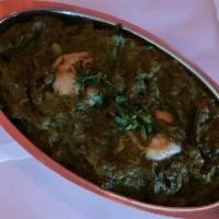 Shrimp Saag · Shrimp cooked in smooth spinach gravy.
