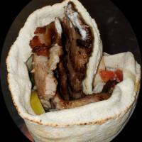 Beef Steak Kabob Wrap · Extra-lean eye round beef thinly sliced, seasoned and grilled. Served with hot sauce, hummus...