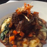 Rosticciana  · Braised beef short ribs, local squash puree, sautéed greens, red wine, aromatic vegetables 