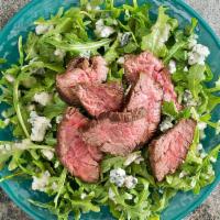 Steak Salad · 4 oz. Tenderloin, arugula, candied walnuts, craisins, mozzarella, onions and balsamic raspbe...