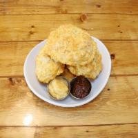 Basket O' Biscuits · Fluffy biscuits served with homemade jam and warm apple butter or honey butter. Great for sh...