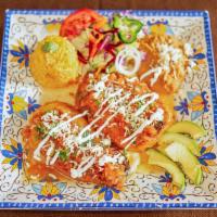 Chiles Rellenos · Stuffed peppers, served with 2 chiles rellenos and cheese.