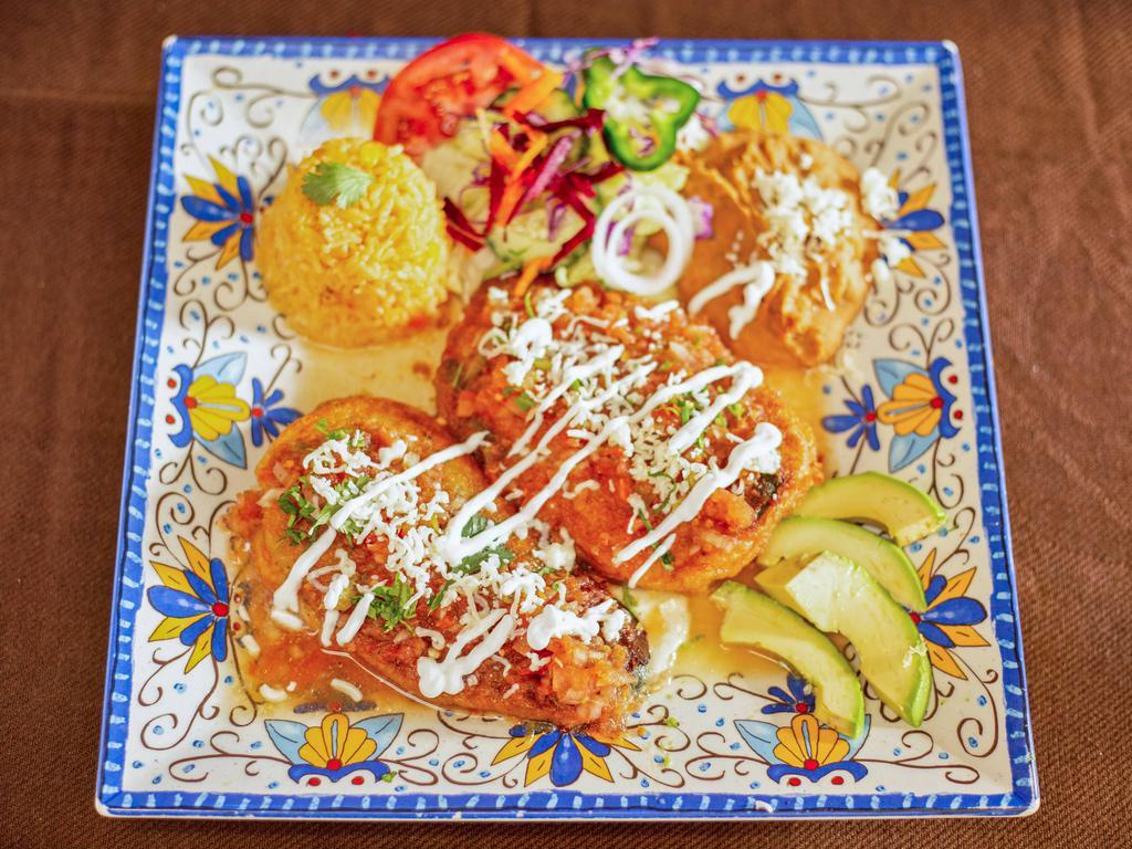Chiles Rellenos · Stuffed peppers, served with 2 chiles rellenos and cheese.
