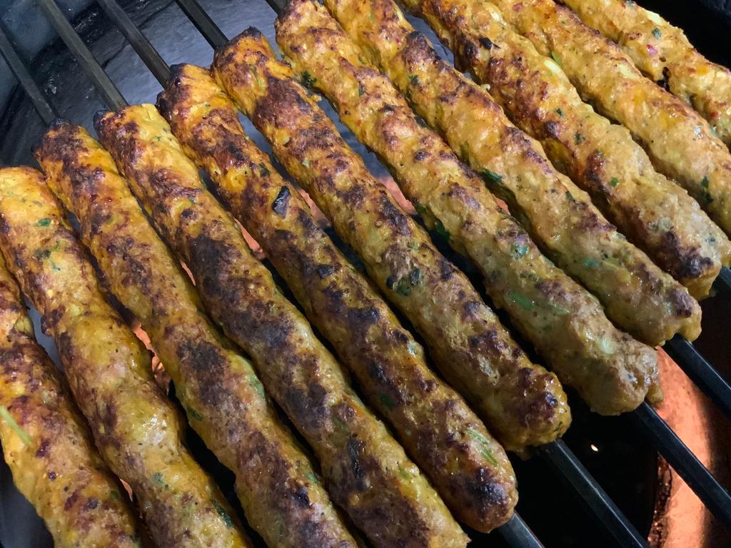 Seekh Kabab · 1 piece. Ground chicken seasoned with herbs, broiled in tandoor.