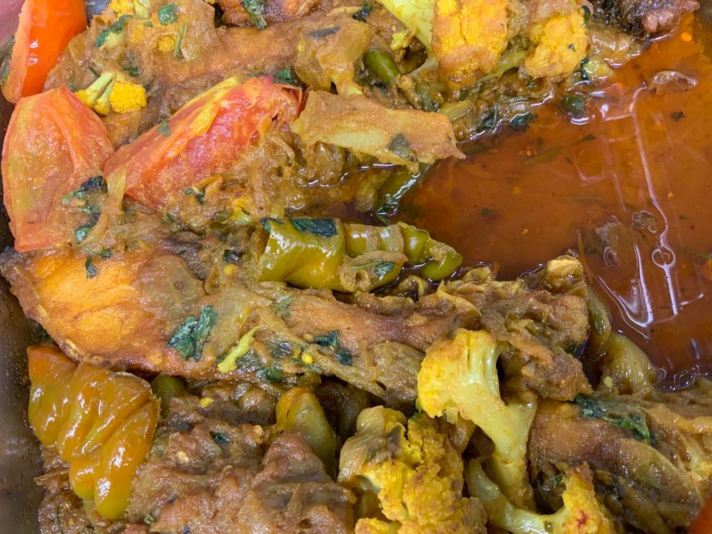 Goat Curry · Goat meat cooked in variety of fine spices.