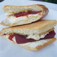 Pan con Timba  · Toasted guava and cream cheese sandwich. With a slight bit of mayo and butter.