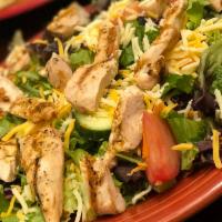 J.Harrod's Salad · Grilled Cajun chicken, bacon, olives, tomatoes,​ and cheese with mixed greens.