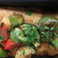 Sauteed Basa · White wine, lemon juice, and butter.​, topped with a medley of fresh vegetables. Served with...