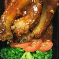 (D)Pork  Rib · Pineapple sauce, pork ribs, broccoli.