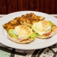 West Coast Eggs Benedict Breakfast · Smashed avocado, Canadian bacon and Gruyere Swiss cheese. Poached eggs served over a split, ...