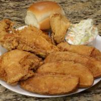 Chicken Dinner · 1/2 chicken, 1/2 broasted potato or corn coblet, coleslaw and a roll.