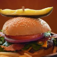 Bacon Cheeseburger · A 1/3 lb. burger patty, topped with crispy bacon and melted American cheese on a sesame bun ...