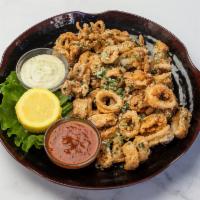 Fried Calamari · Mixed in with Cherry Peppers and side of Marinara