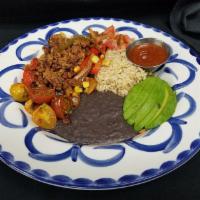 Vegan Fajita Bowl · Beyond meat and fajita veggies, roasted corn and marinated heirloom tomatoes served over bro...