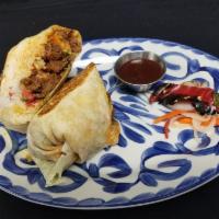 Pulled Chicken Burrito · Pulled chicken with cilantro rice, refried beans, fresh guacamole, pico de gallo and oaxacan...