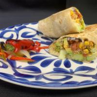 Veggie Burrito · Rainbow cauliflower, roasted corn, black beans, cilantro rice, pico de gallo, fresh avocado,...