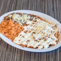 Chilaquiles Breakfast · Served with rice, beans, sour cream and salsa. Can add eggs and meat for an extra charge.
