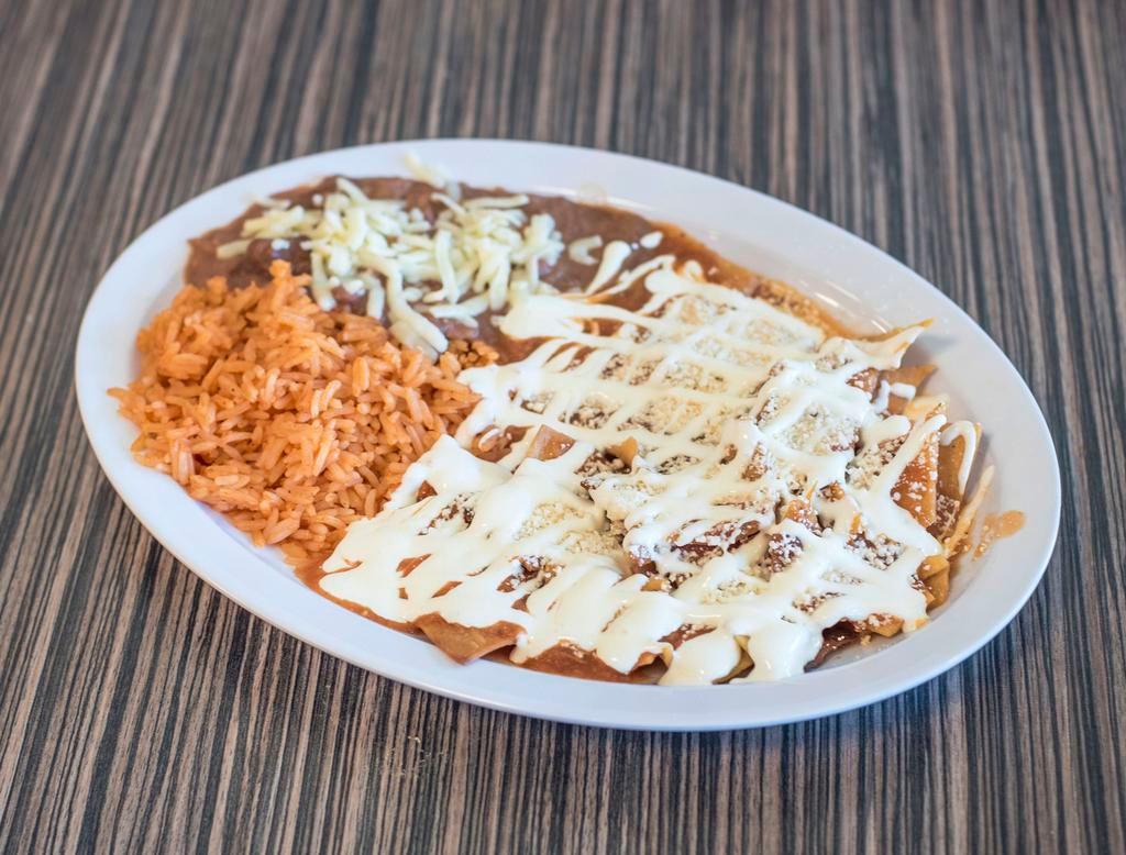Chilaquiles Breakfast · Served with rice, beans, sour cream and salsa. Can add eggs and meat for an extra charge.