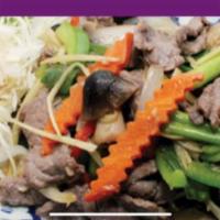 3. Beef Ginger · Sauteed beef with fresh ginger, bell pepper, onions, carrots and mushrooms.