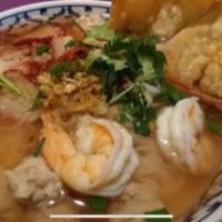 7. House Noodles Soup · Rice noodles with ground chicken, fish balls, fish cake, shrimps, fried wonton bean sprouts ...
