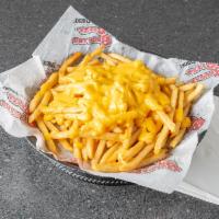 Cheese Fries · Our regular cut french fries smothered in cheddar cheese sauce. Full 1-pound serving.
