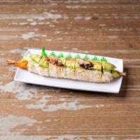 Tokyo Roll · Spicy scallop, green onion, cucumber on the inside and avocado, salmon, tuna, spicy mayo, ee...