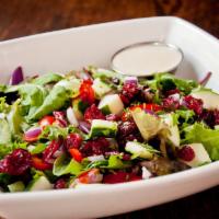 House Salad · Field greens, hot-house cucumbers, red onions, tear-drop tomatoes, dried cranberries, with l...