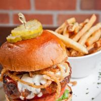 The Angry Burger · Blue cheese dressing, crispy onions and franks hot sauce. Served with a choice of side.
