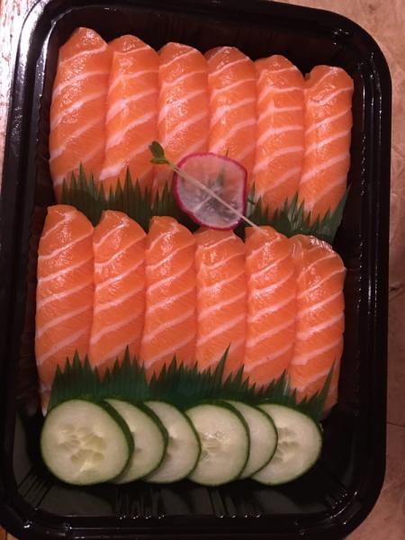 Salmon Sushi Lunch · 5 pieces salmon sushi and 1 spicy salmon roll.