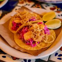 Pescado Tacos · Pan fried porgy, cabbage slaw, chipotle aioli, crispy shallots (2 per order)