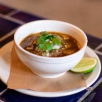 Consome De Birria · Birria, onions, cilantro