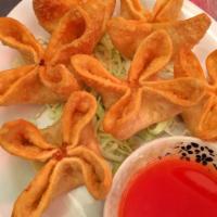 Crab Cheese Wontons · 6 pieces. Dressing on the side