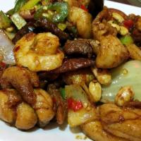 Kung Pao Triple Delight · Chicken, beef and shrimp. Served with steamed rice. Hot and spicy.