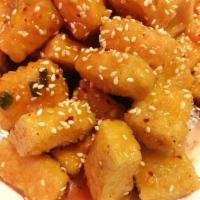 Sesame Tofu · Fried tofu. Served with steamed rice. Hot and spicy.