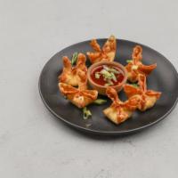 A.3 Crab Rangoon · Crispy wonton skin filled with celery, cream cheese and crab meat.