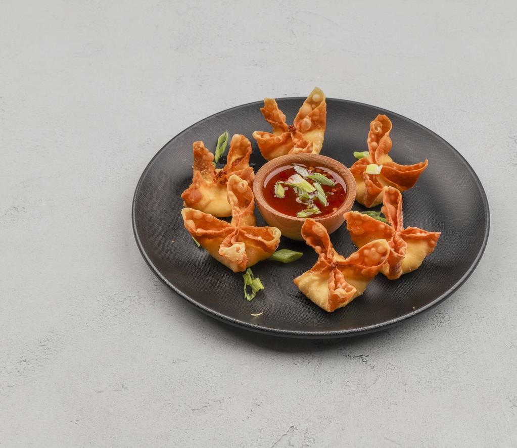 A.3 Crab Rangoon · Crispy wonton skin filled with celery, cream cheese and crab meat.