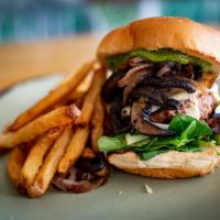 Mushroom Onion and Swiss Burger · Impossible or Beyond patty, swiss cheeze, roasted portabella, grilled onion, artisan greens,...