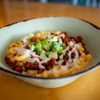 Loaded Mac and Cheese · All loaded items come with melted cheeze, garlic aioli + scallion

Choose 1 additional top...