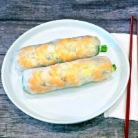 Goi Cuon · 2 Steamed pork and shrimp spring rolls with dipping peanut dipping sauce.