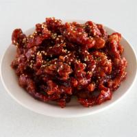 Peking Spare Ribs · Crispy fried boneless ribs in Secret Peking style sauce top with sesame seeds.